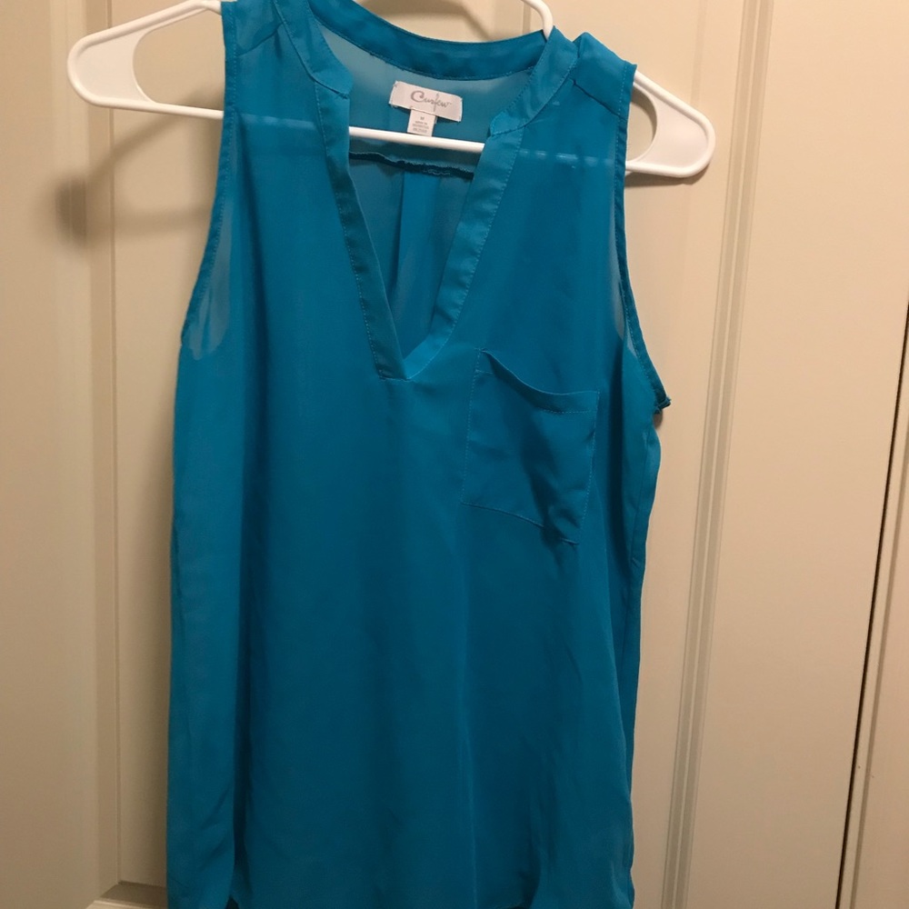 Two tank tops by curfew